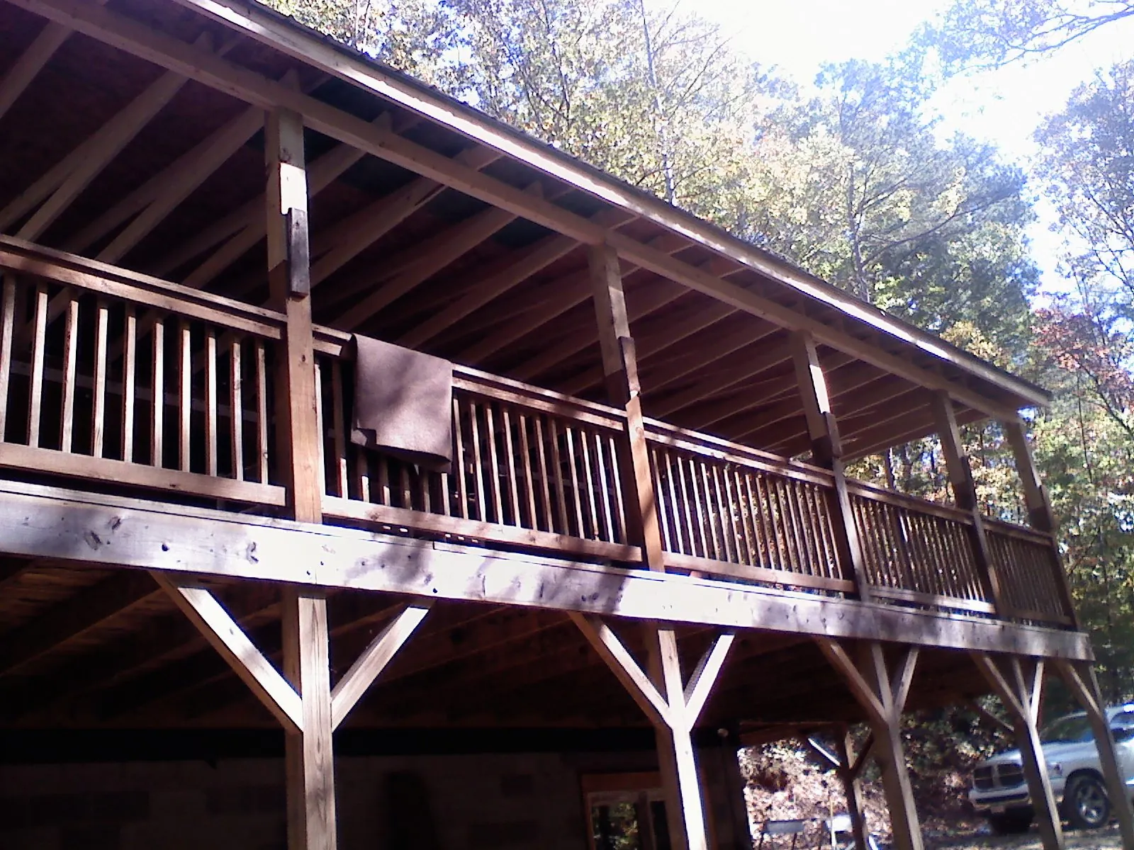 Timber framing under a new elevated porch and deck — Roof Leak Repair in Petroleum by Roofing Brothers